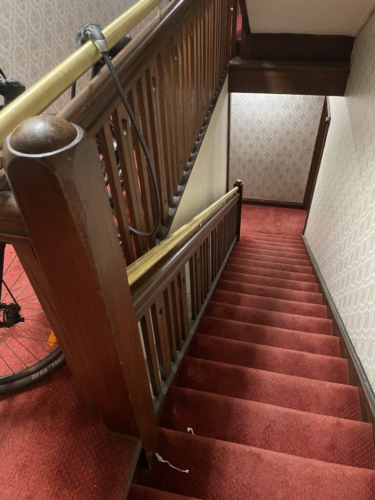 Architectural internal stair balustrade in steel within a contemporary interior