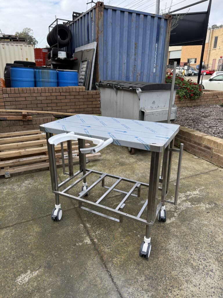 Custom stainless steel medical trolley fabrication Sydney workshop build